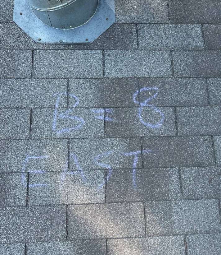Chalk test square with its hit count written on the east slope of a St. Paul Park, MN roof, September 2025