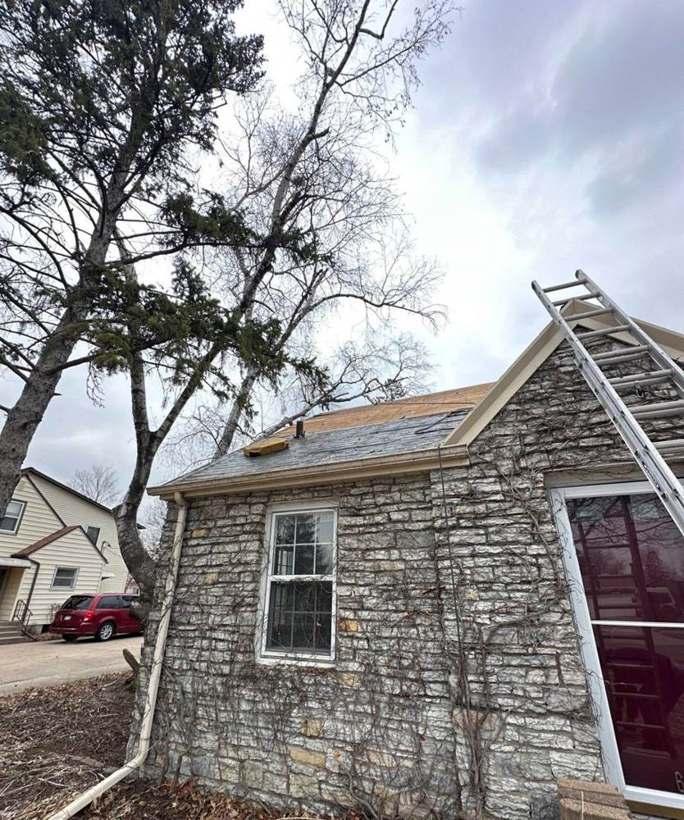 New sheathing on the roof above a stone gable wall in Richfield, April 2025