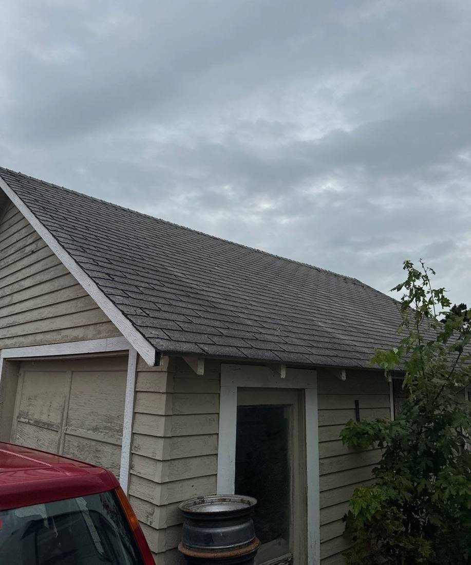 Detached garage roofline photographed during a Goodhue property inspection, August 2024