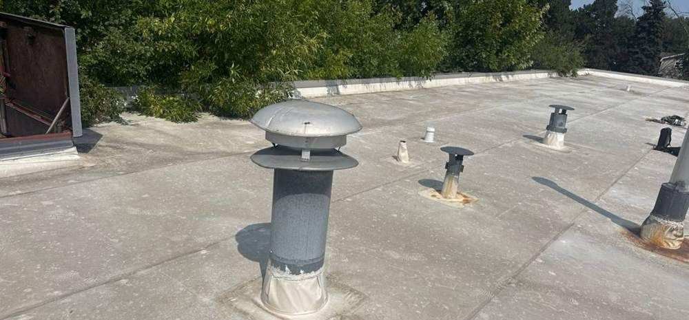 Flat commercial roof and rooftop vents at the Goodyear store on Silver Lake Road NE in St. Anthony, MN