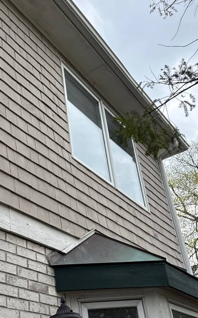 Cedar-shake style siding inspected on a Hinsdale home, May 2026