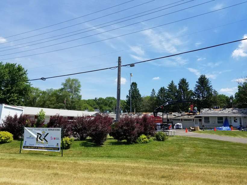 Repair King yard sign in front of Red Rock Lodge at 1280 Hastings Avenue in Newport, MN