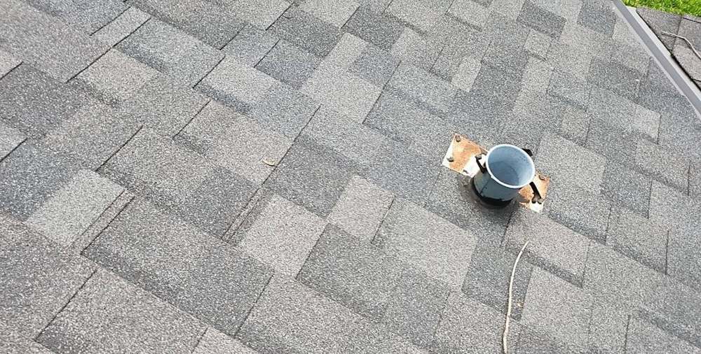 Roof vent stack photographed during a Hastings inspection, July 2023