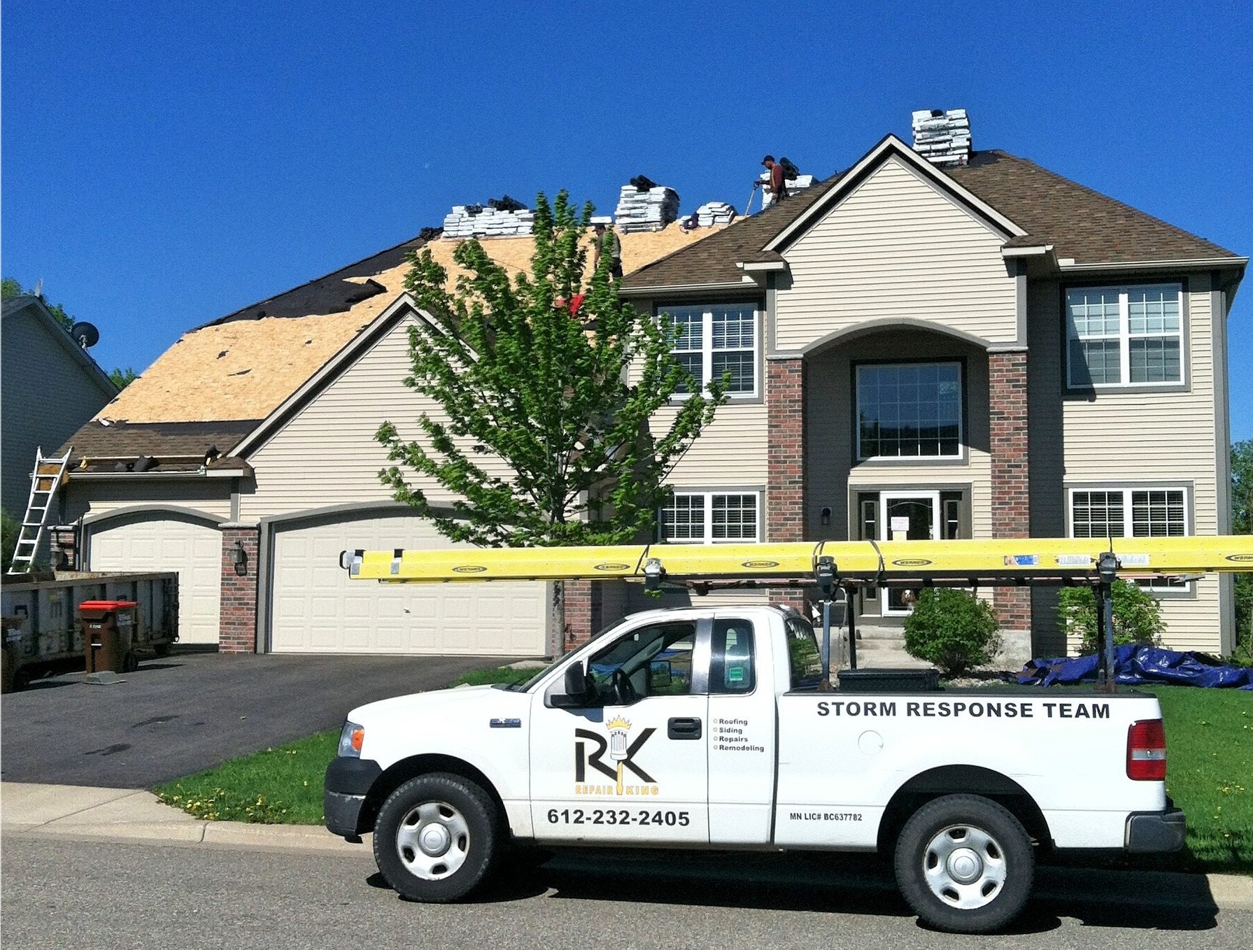 Repair King Storm Response Team truck at a St. Paul roof replacement, original logo