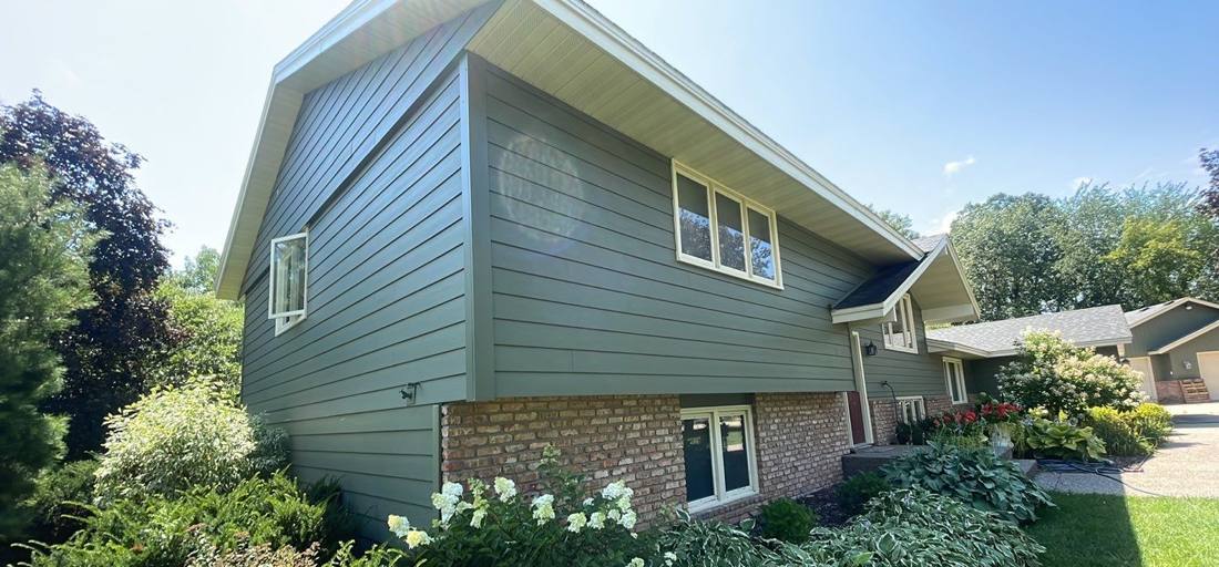 Siding and roofline detail on a Prior Lake home during an inspection, July 2023