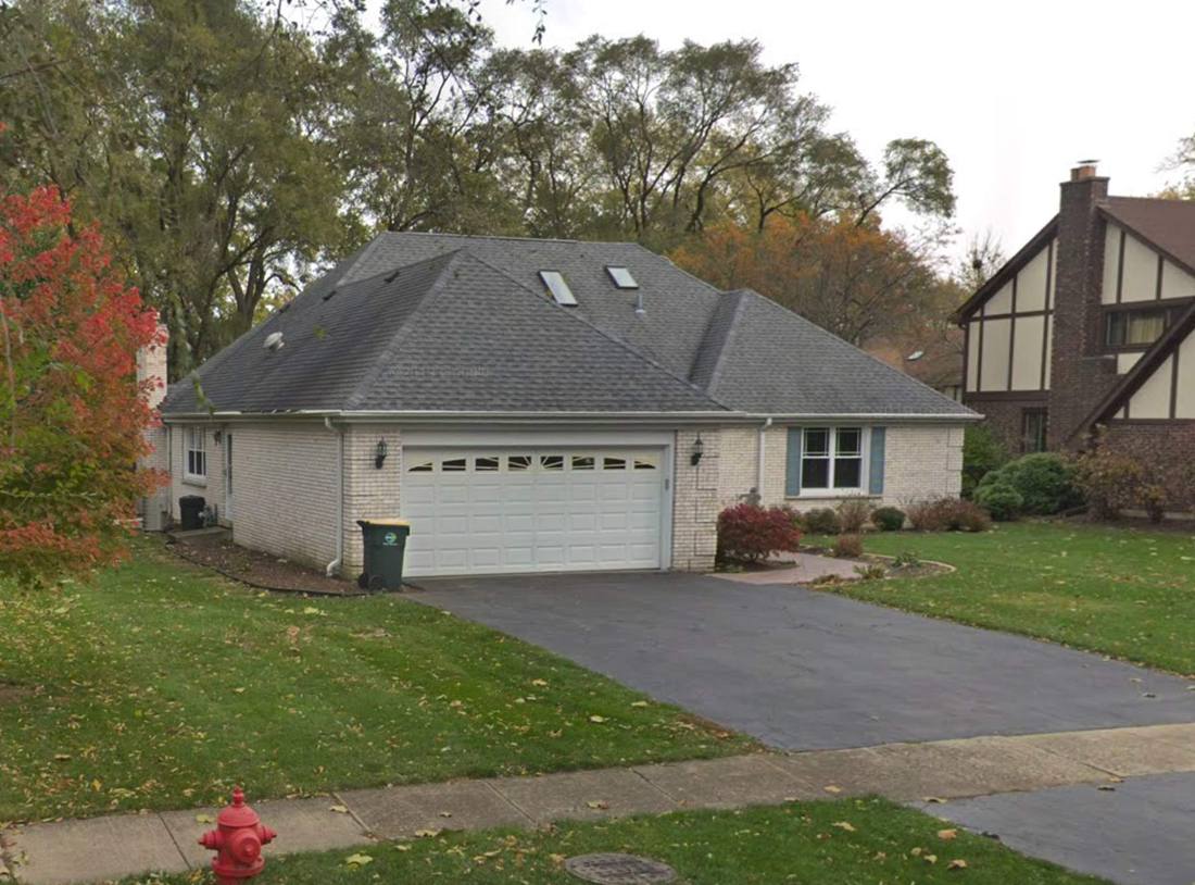 Brick ranch home in Downers Grove photographed during a roof inspection, July 2026
