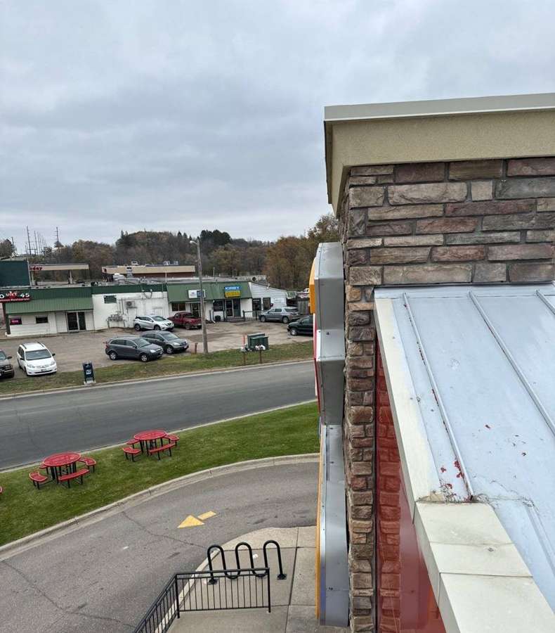 Roof edge above the Dairy Queen patio looking toward Highway 12 in Delano, November 2023