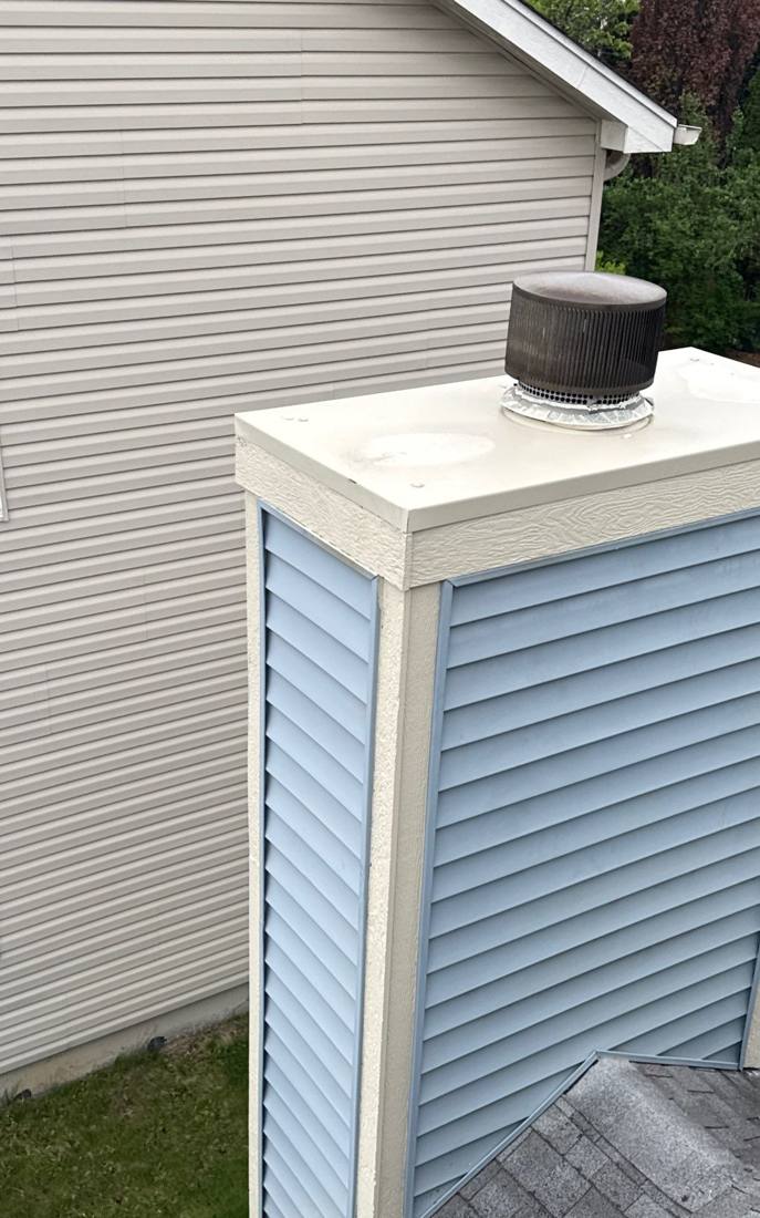 Roof vent enclosure checked for wind and hail damage, Plainfield, April 2026