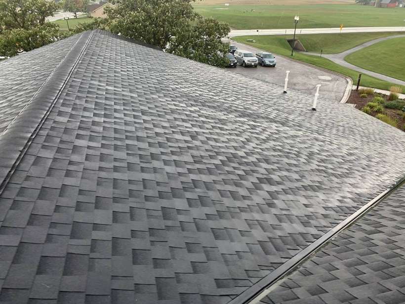 New shingles on the Coyote Moon Grille clubhouse roof above the Territory Golf Club parking lot in St. Cloud, MN