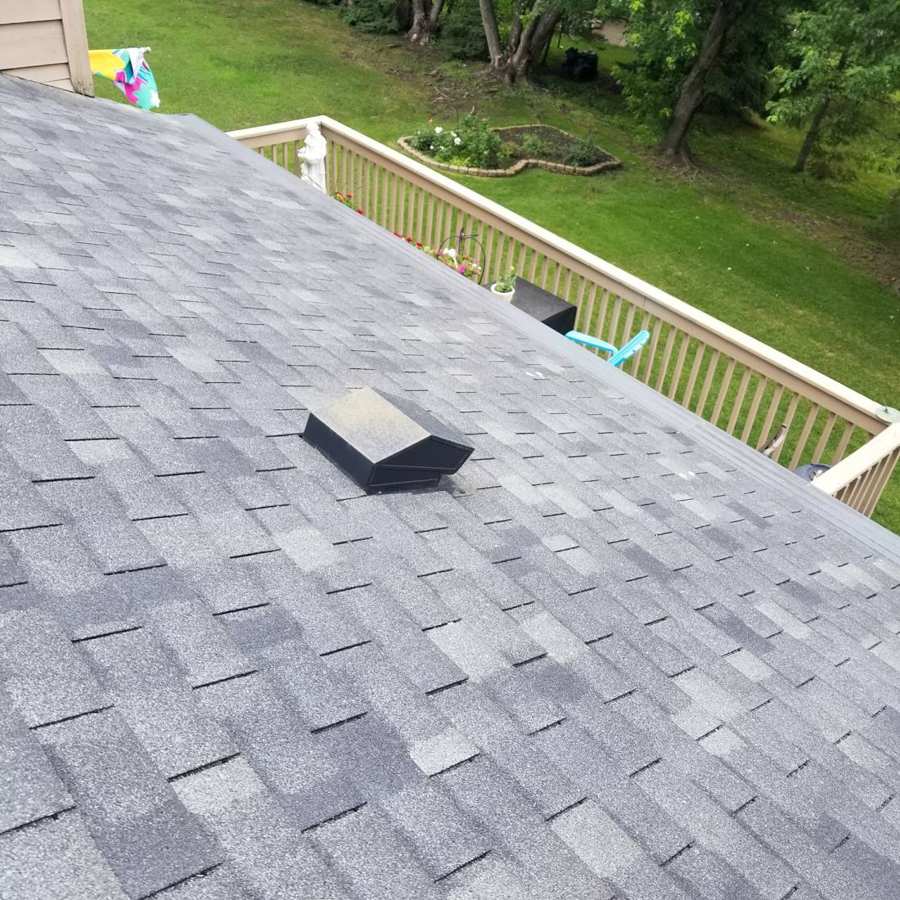 Shingle roof above a backyard deck during a Coon Rapids inspection, June 2017