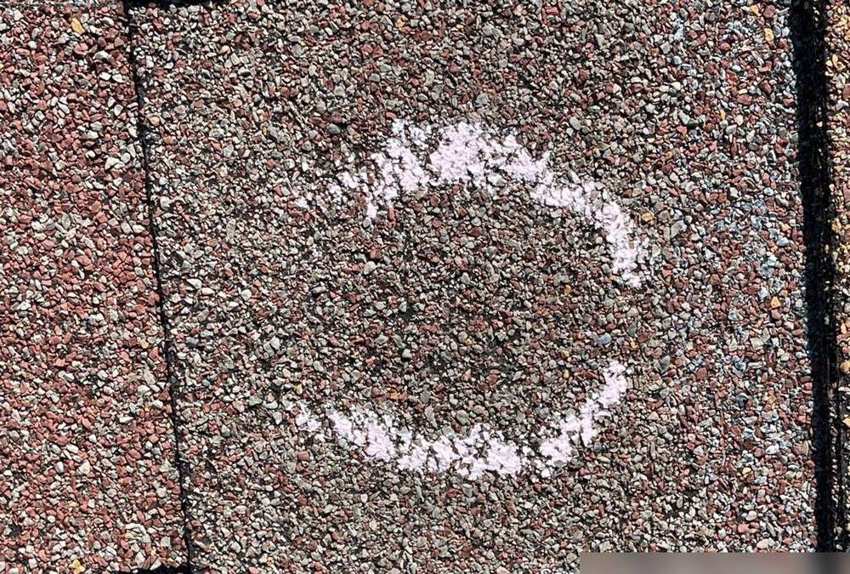 Hail hit chalk-marked on a St. Cloud roof during an inspection, September 2021