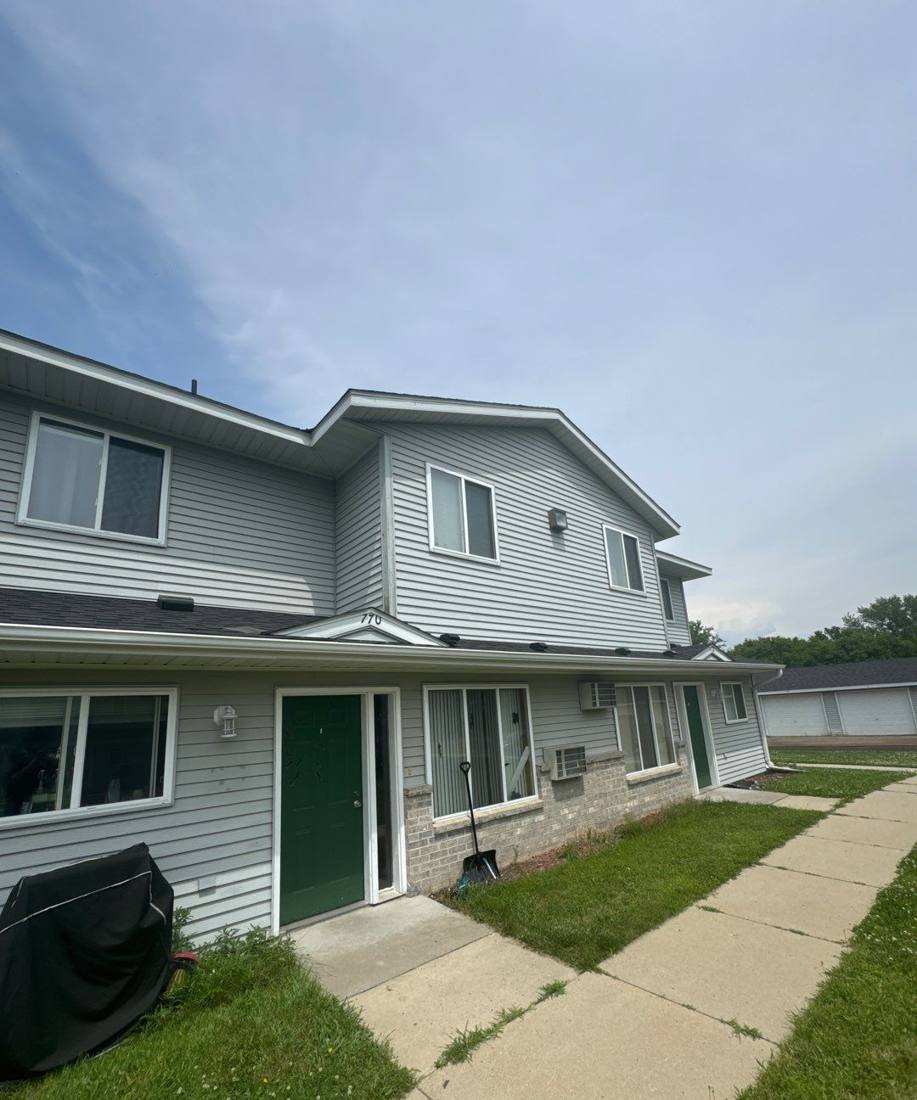 Finished Waters Edge townhome unit after re-roofing, July 2024