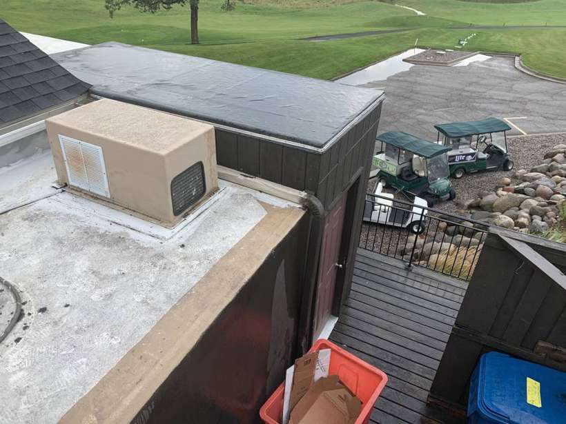 Rooftop equipment on the Coyote Moon Grille flat roof, St. Cloud