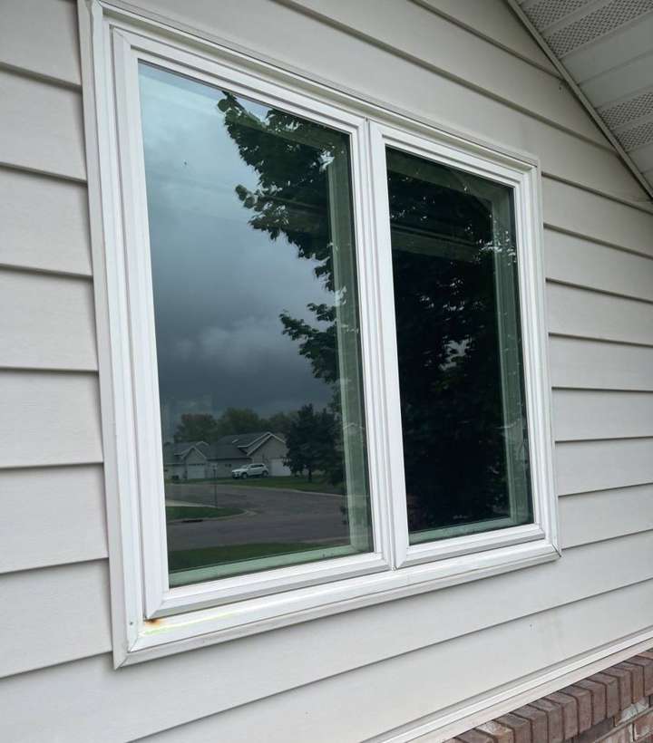 Window and vinyl siding on a Sauk Rapids home, photographed during an October 2021 inspection