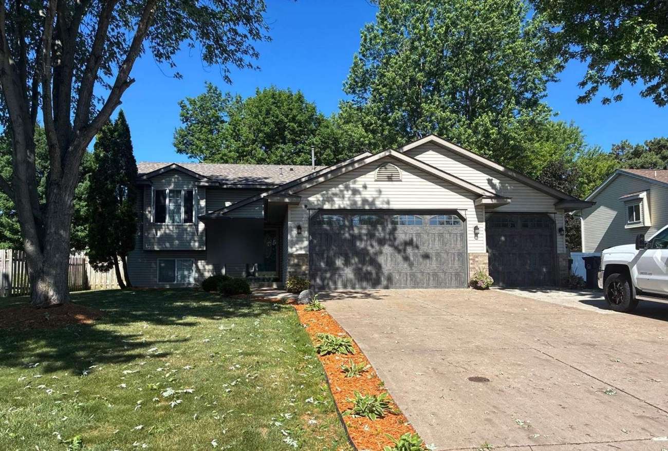 Split-level home in Chisago City, MN photographed by Repair King during a June 2026 roof inspection