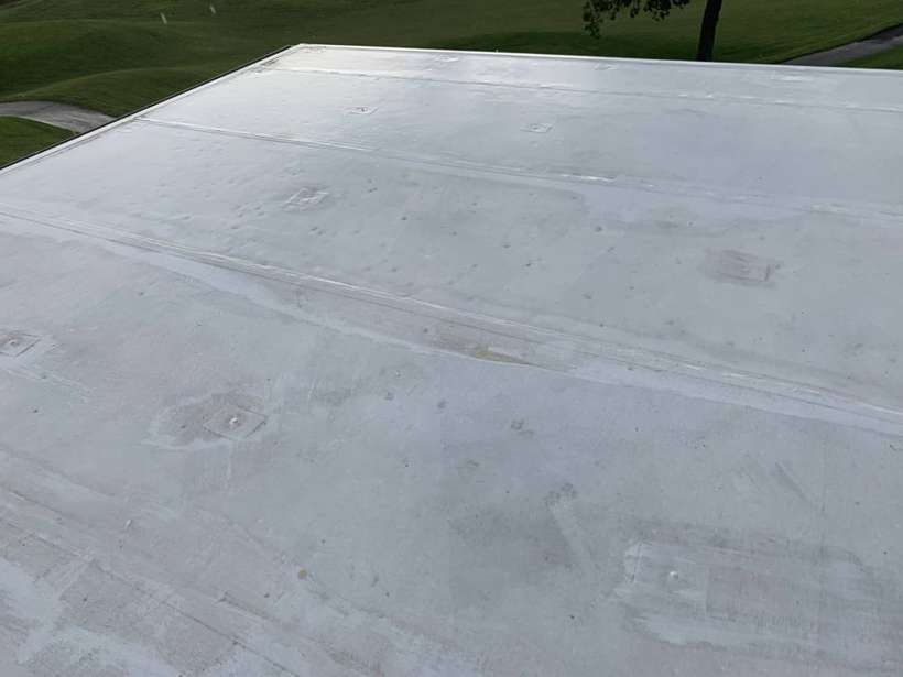 White Duro-Last flat roof at the Coyote Moon Grille clubhouse, Territory Golf Club, St. Cloud