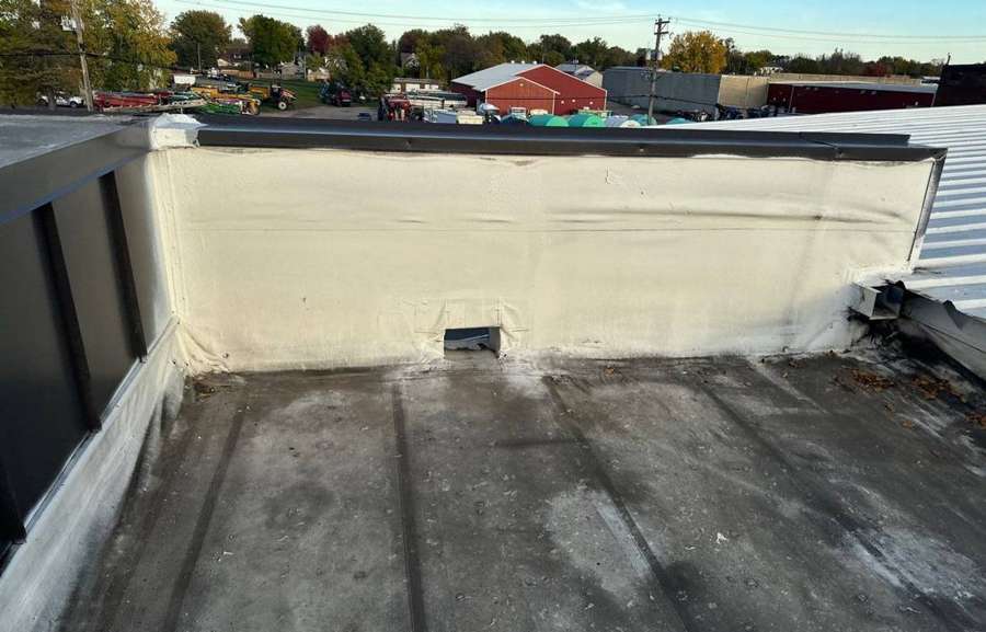Parapet and low-slope roof at The Marketplace in Cokato, October 2023