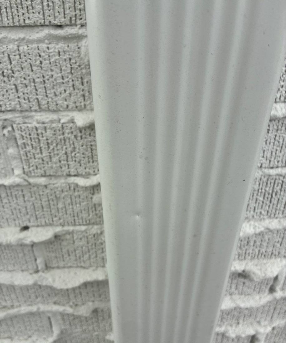 Downspout detail on a Downers Grove home during a siding project, April 2026