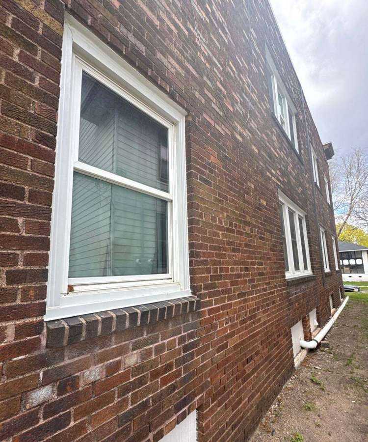 Brick window and wall detail at Capital City Condos on Dayton Avenue, April 2024