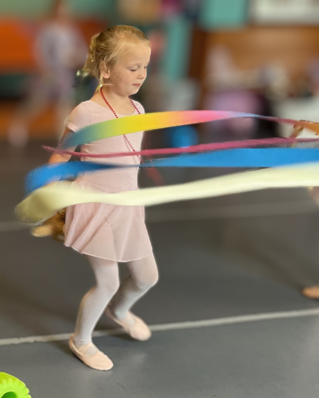 Children practicing acrobatics at a Prince William Dance Academy after school program