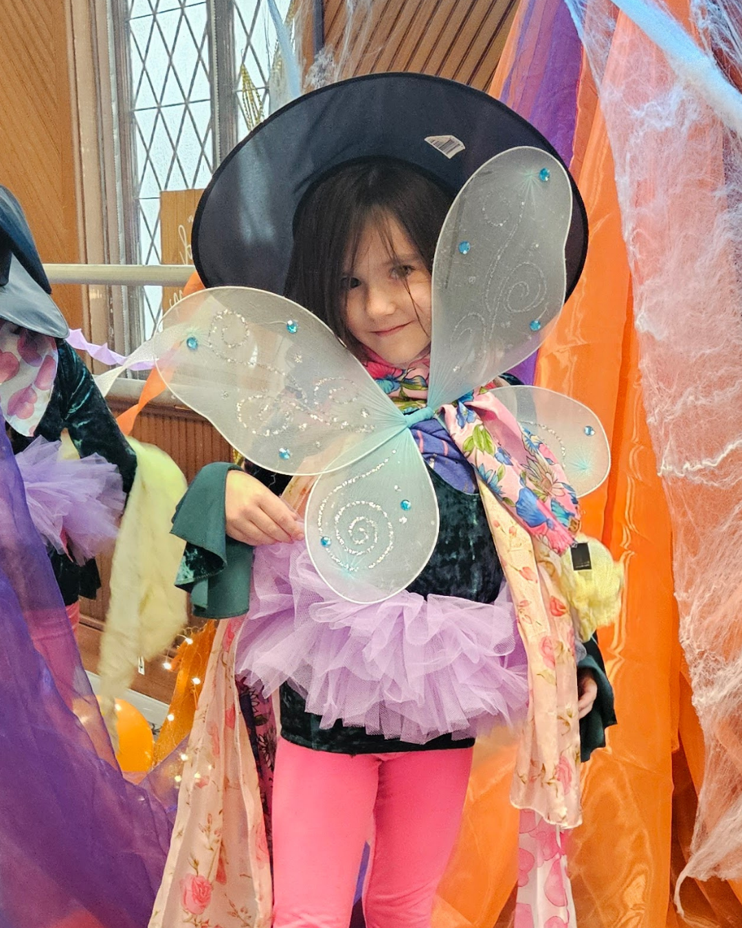Young dancer in a witch hat and fairy wings at a past Boo Bash Halloween dance party at Prince William Dance Academy in Nokesville, VA