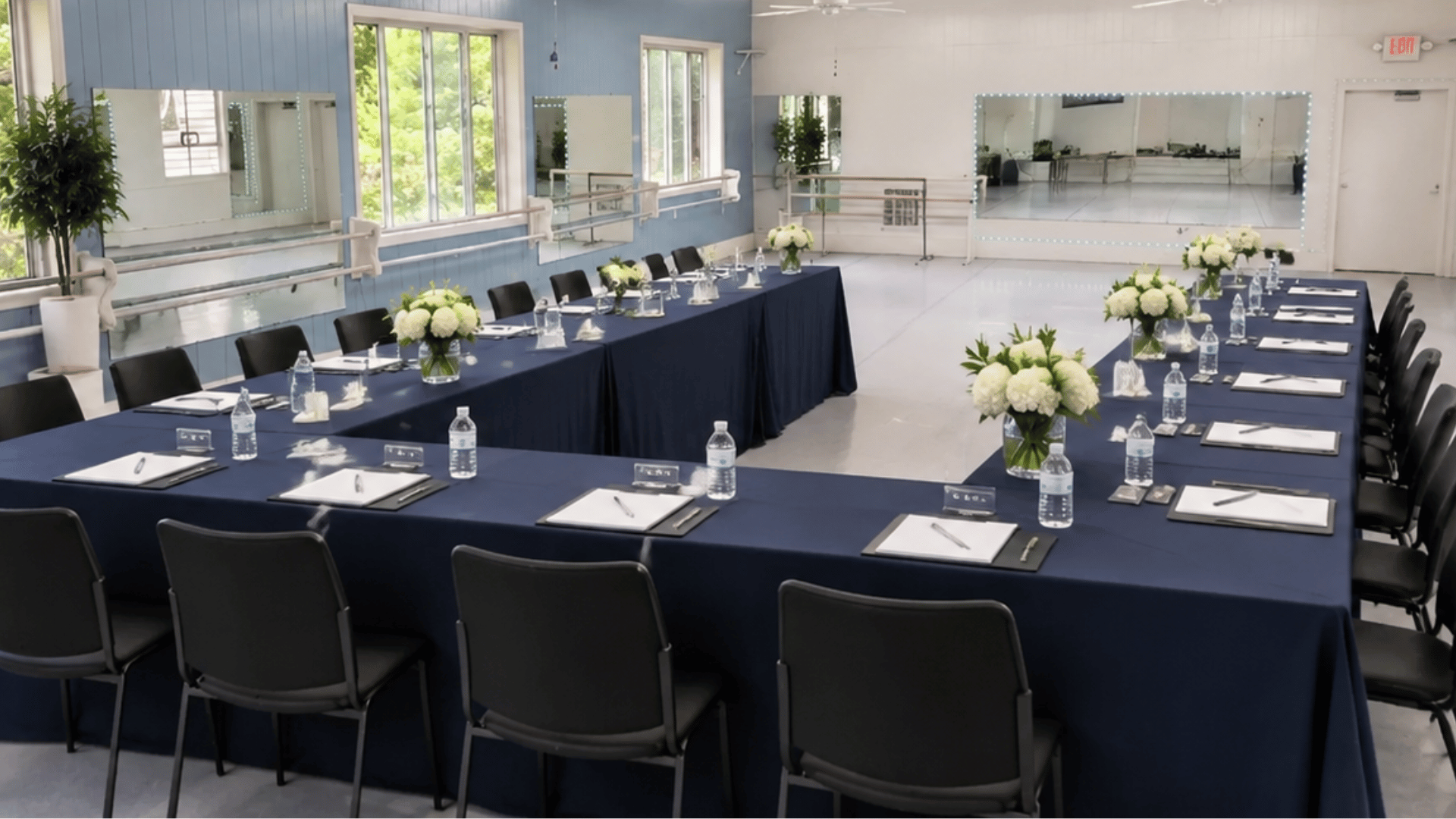 Tables and chairs arranged for a business meeting inside PWDA's Nokesville rental space