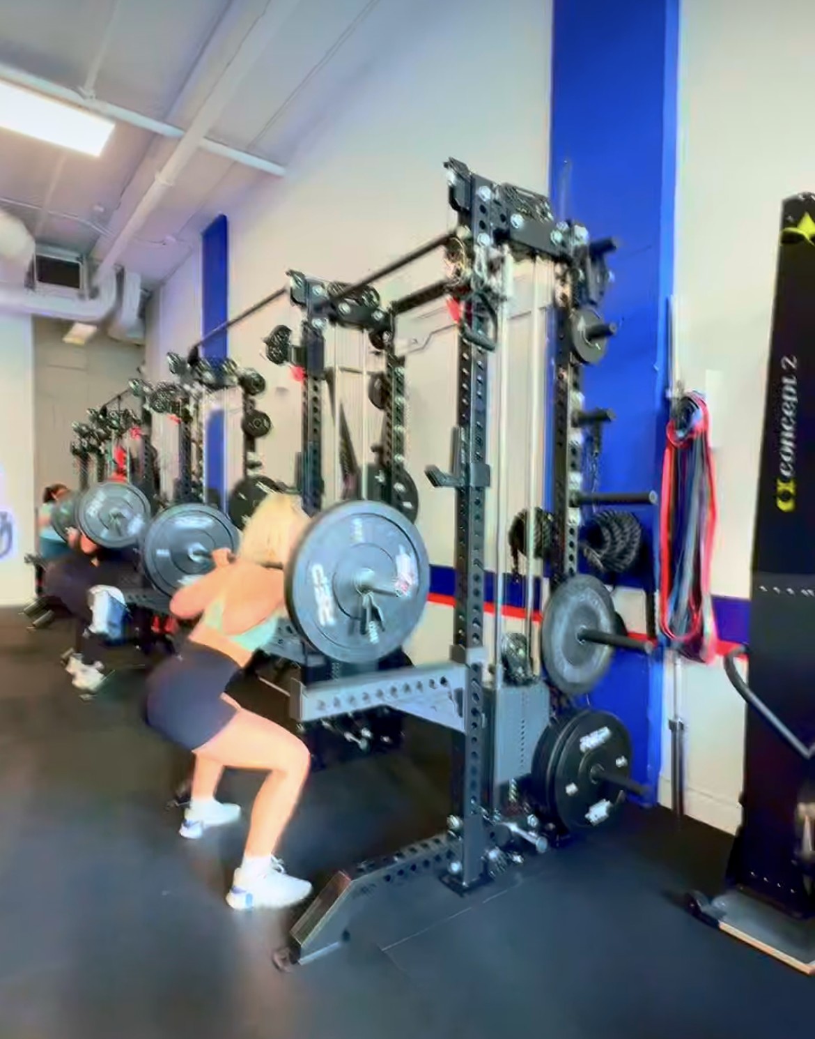 Members training at the squat racks at F45 Humber Bay