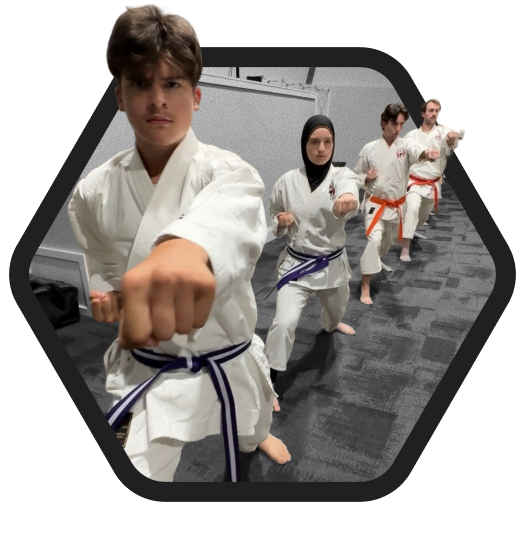 Image of students practicing karate at Rei Karate in Barrie, emphasizing the benefits of focus, discipline, and respect.