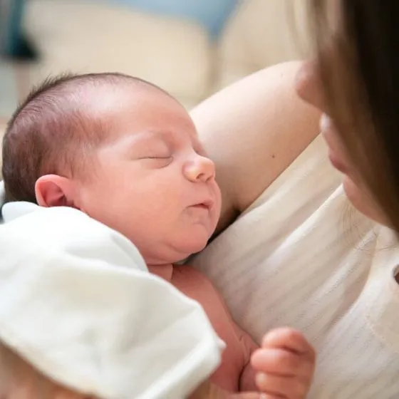 mum gazing at her sleeping newborn baby mum gazing at her sleeping newborn baby