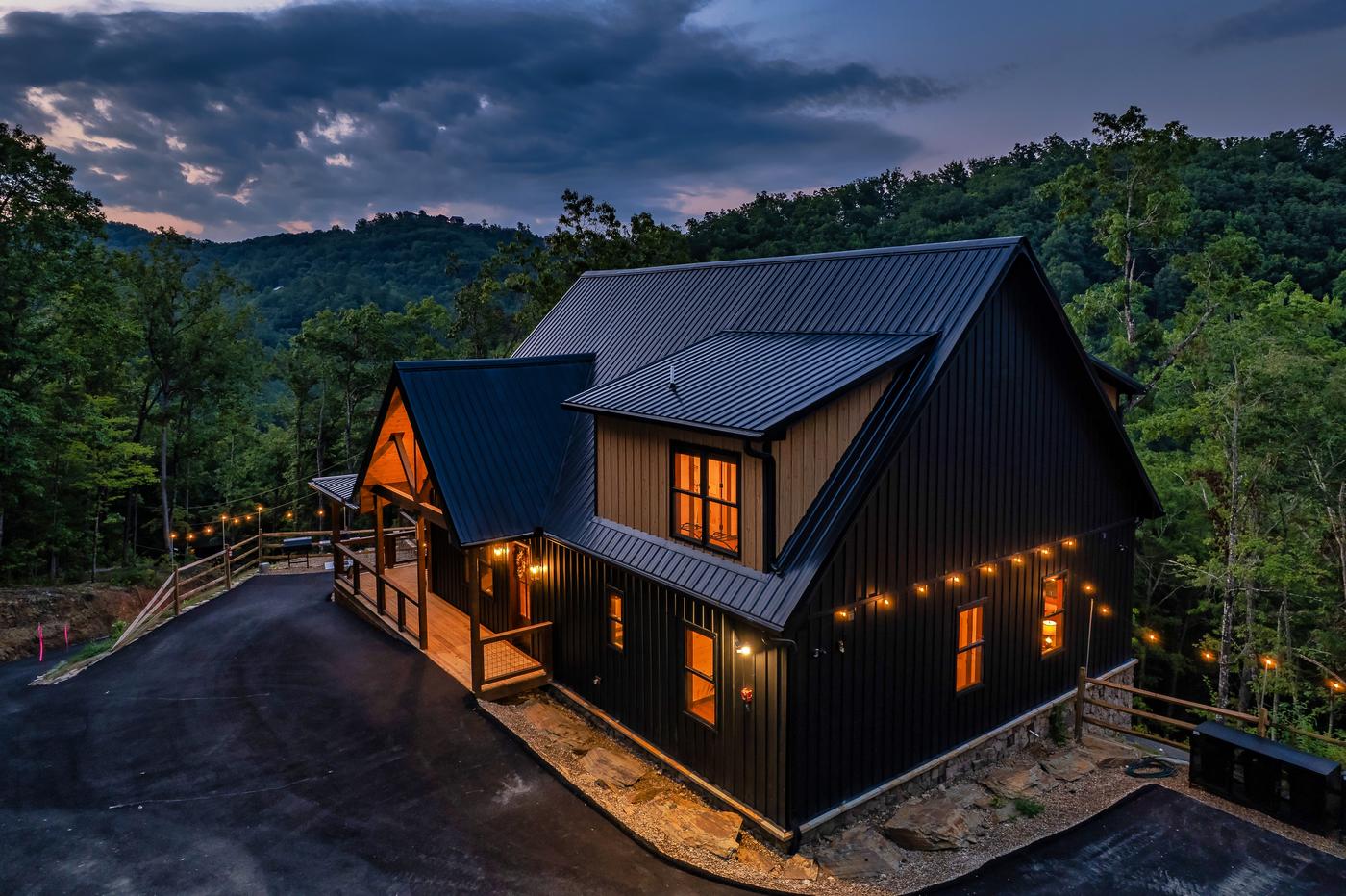 Onyx Lodge — wooded mountain setting at dusk