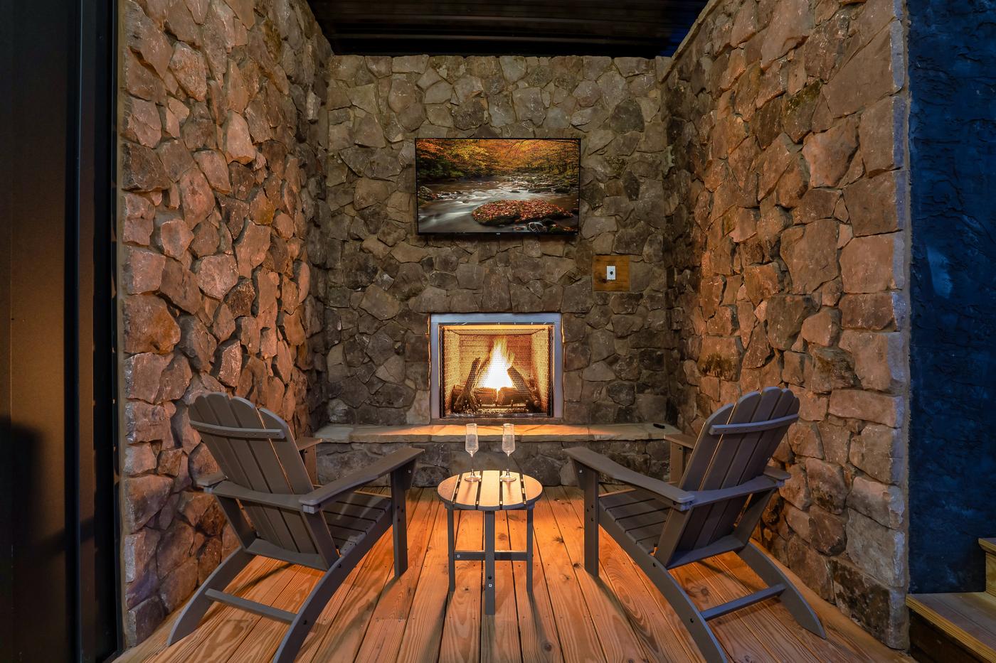 Stone fireplace alcove — intimate seating for two