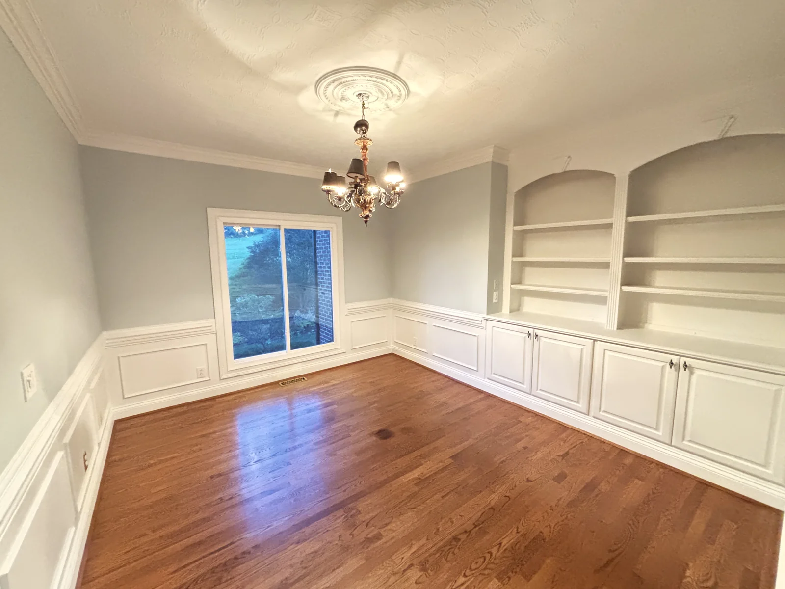 Finished interior trim and architectural detail completed by Quality Painters