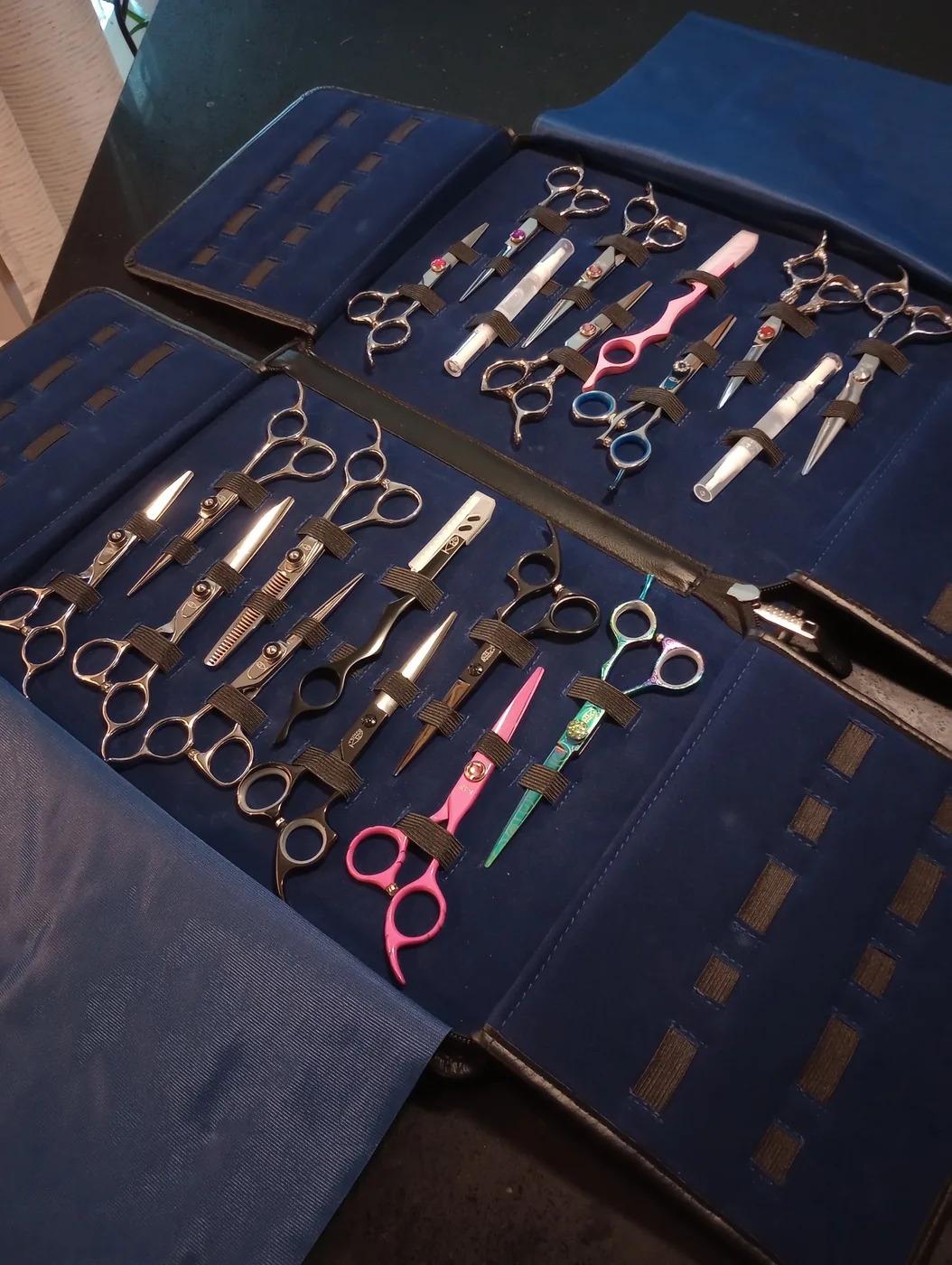 Case of brand new professional hair cutting and texturizing shears for sale to try and buy