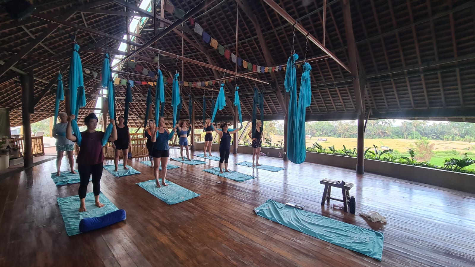 Guests enjoying aerial yoga at the retreat