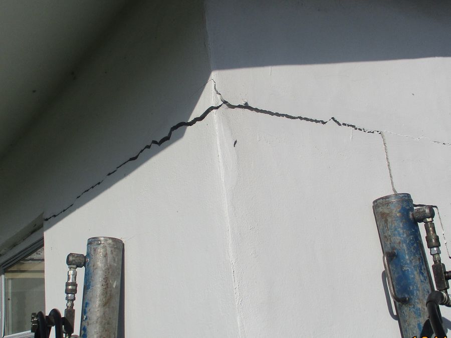 Corner crack with piers set on both walls during repair