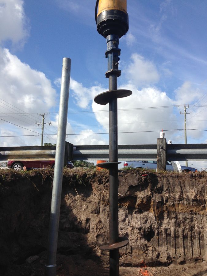 Helical pile with helix plates during installation