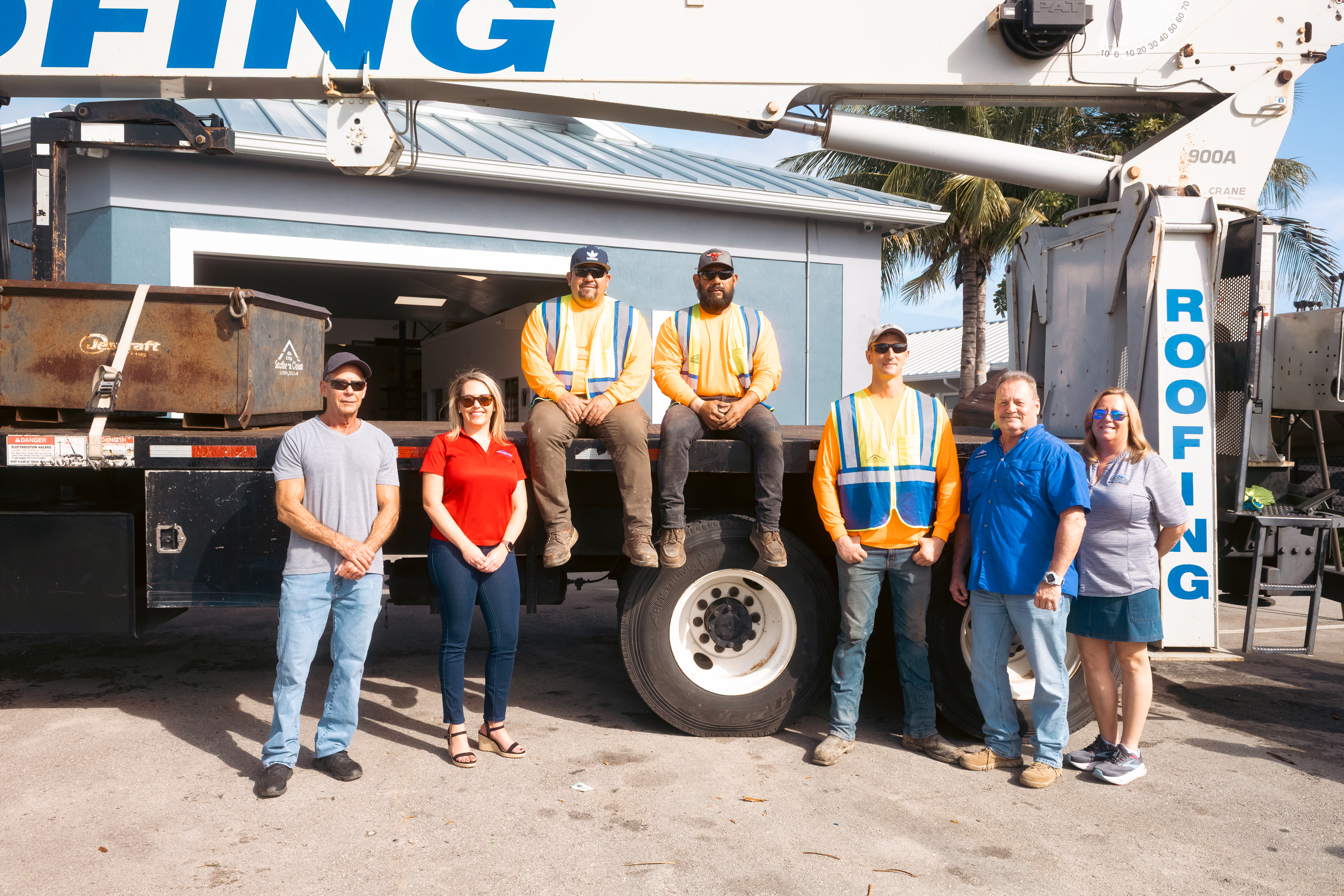 Southern Coast Foundation Systems crew standing beside a company work truck