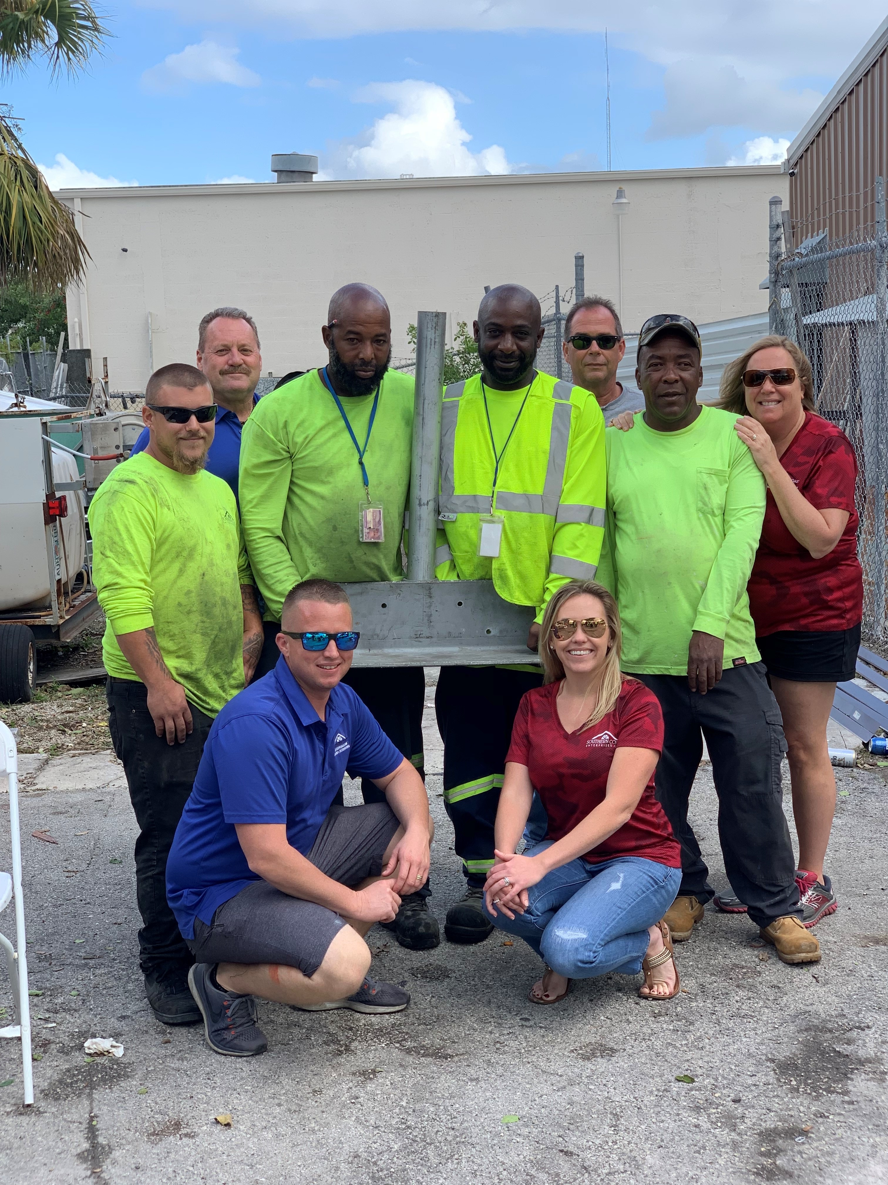 Southern Coast Foundation Systems team gathered beside foundation equipment