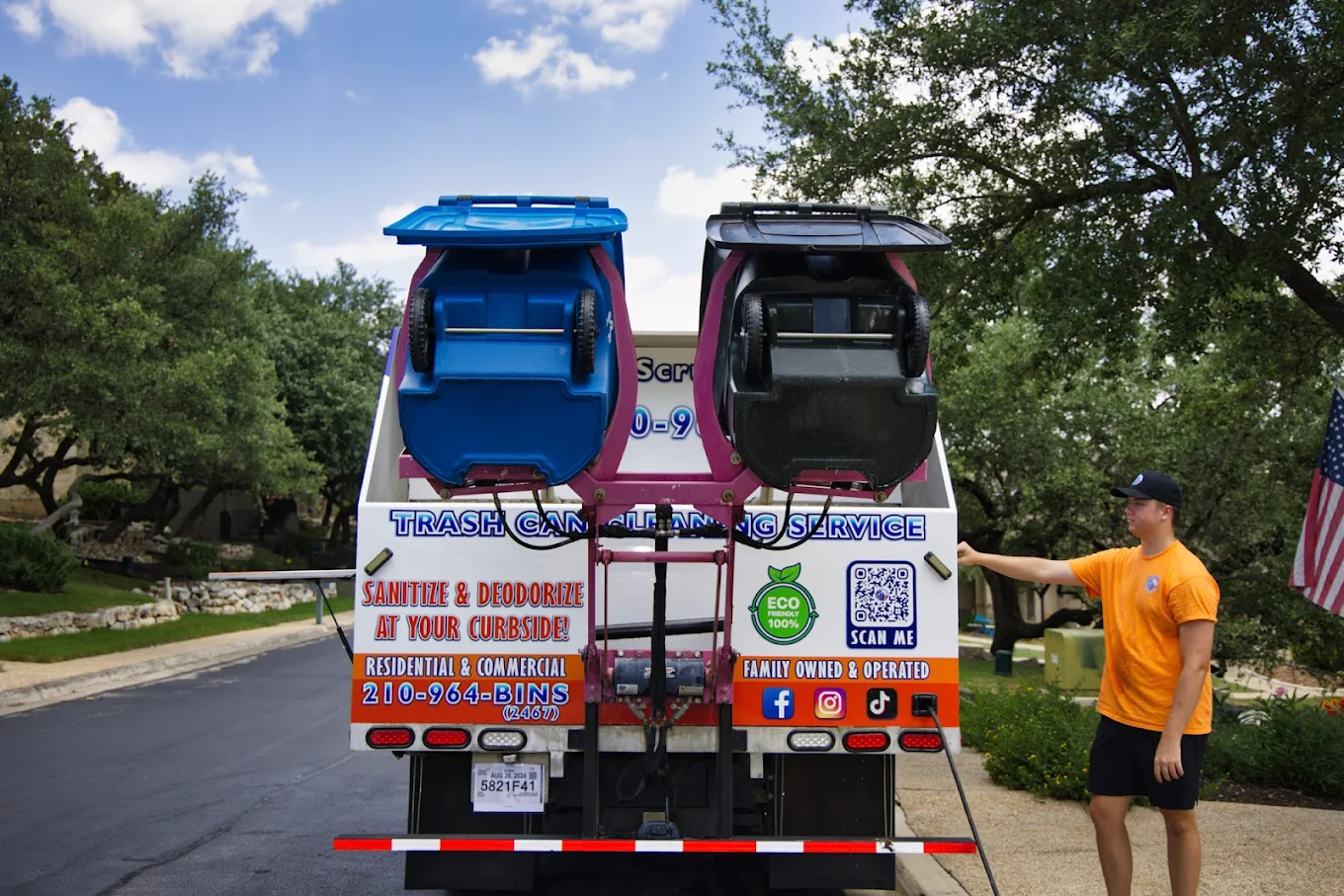 Trash can cleaning service truck sanitizing and deodorizing residential bins using eco-friendly cleaning methods.