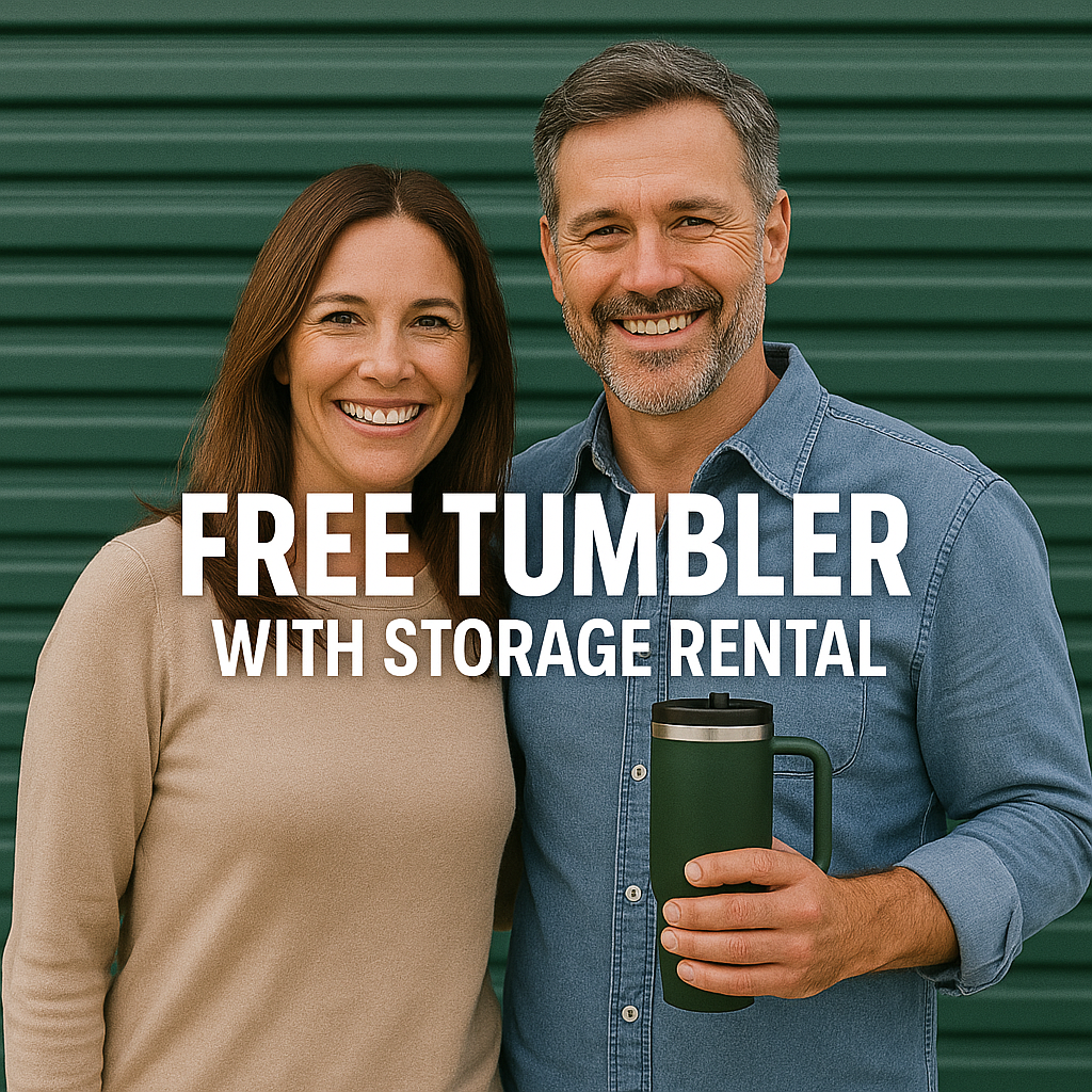 Couple with free tumbler at storage unit - The Frozen Rent Event