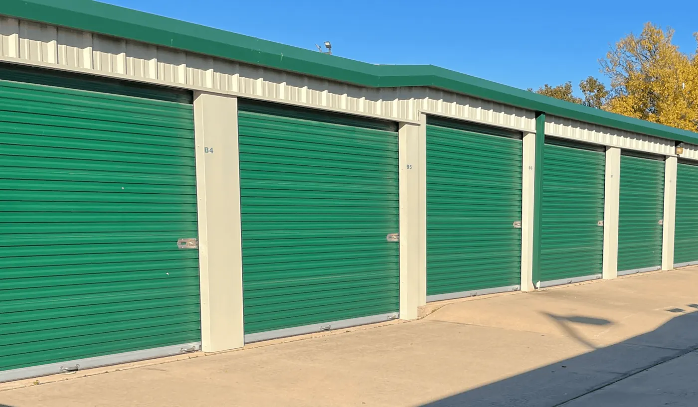 Row of green drive-up storage unit doors at the Cache Road location in Lawton, OK