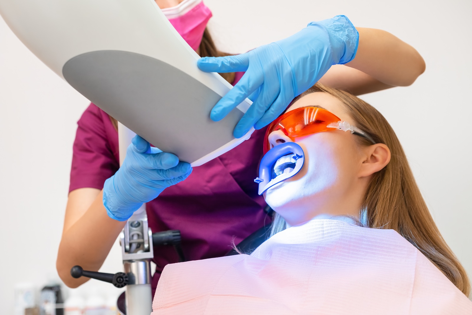 Woman with a bright, white smile after professional teeth whitening at Impact Dental Liverpool