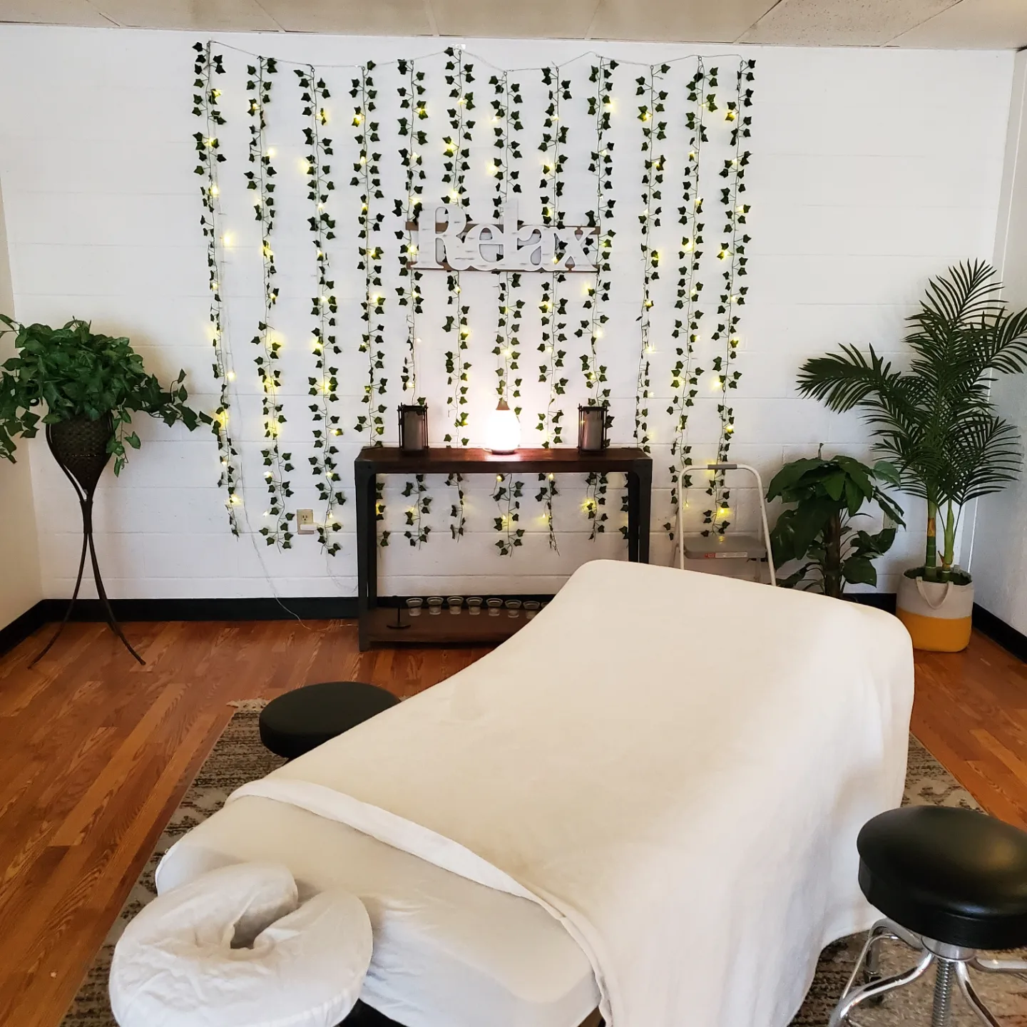 Soul Renewed Massage Treatment Room with twinkle lights and massage table