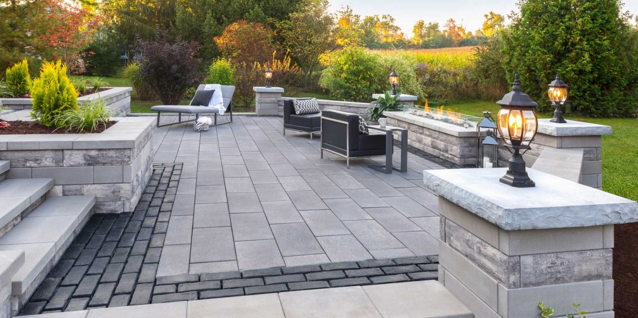 Paver driveway with accent border at North Barrington luxury home