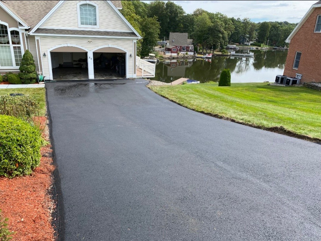 Fresh residential asphalt driveway