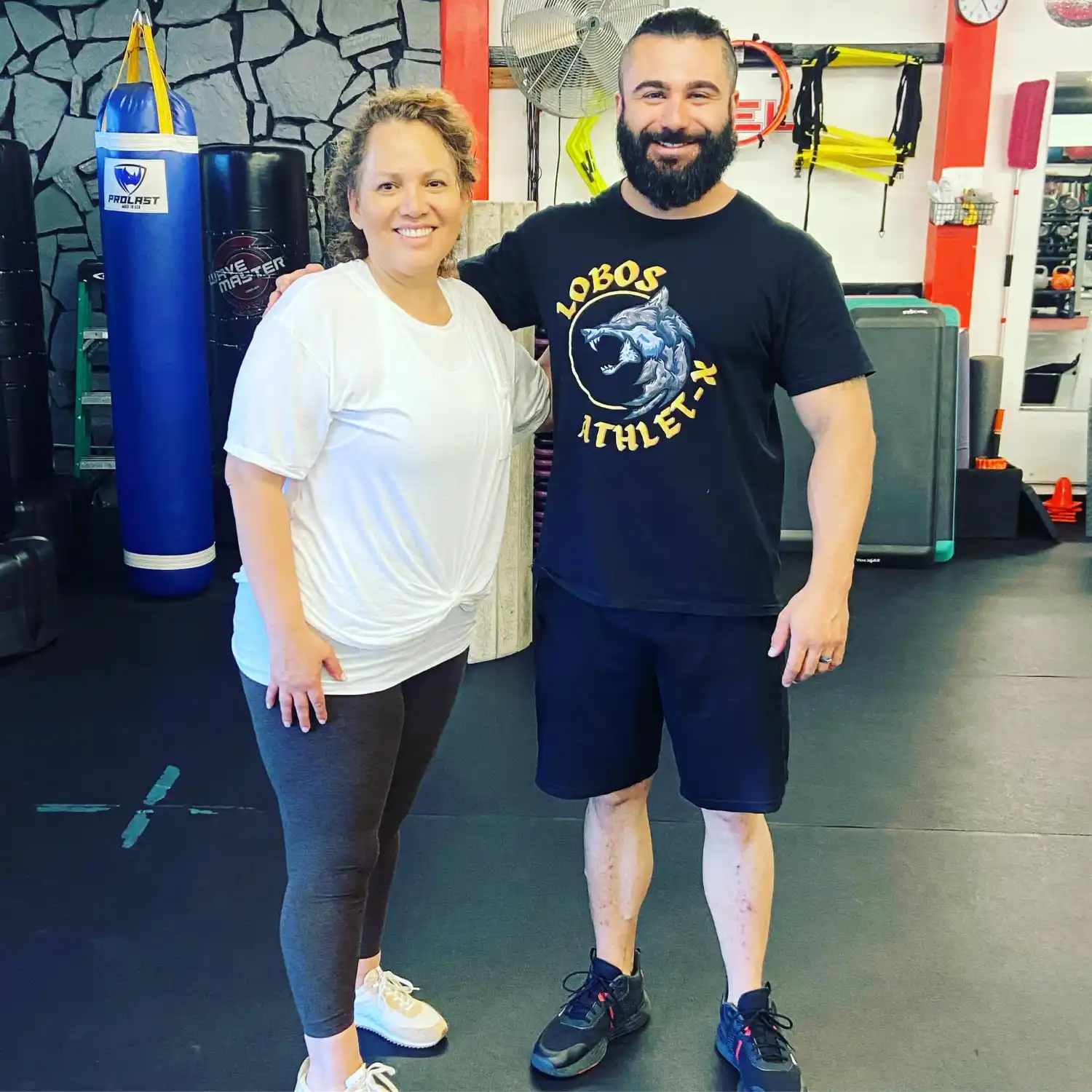 Darin Borst and member training together at Xcel Fitness