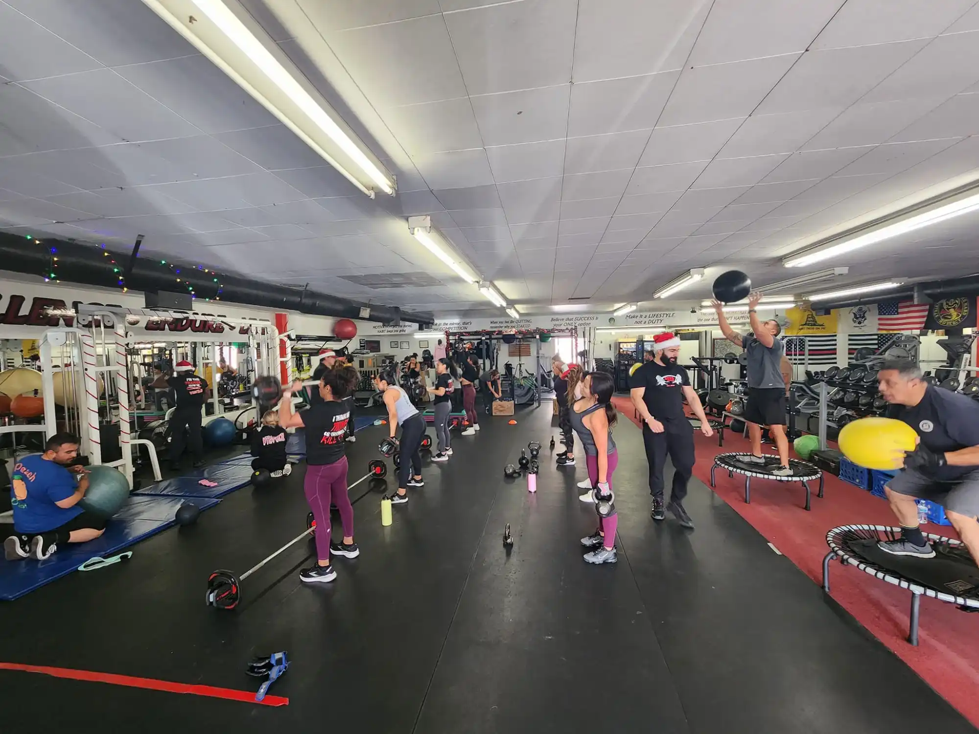 Group cardio kickboxing and conditioning session at Xcel Fitness
