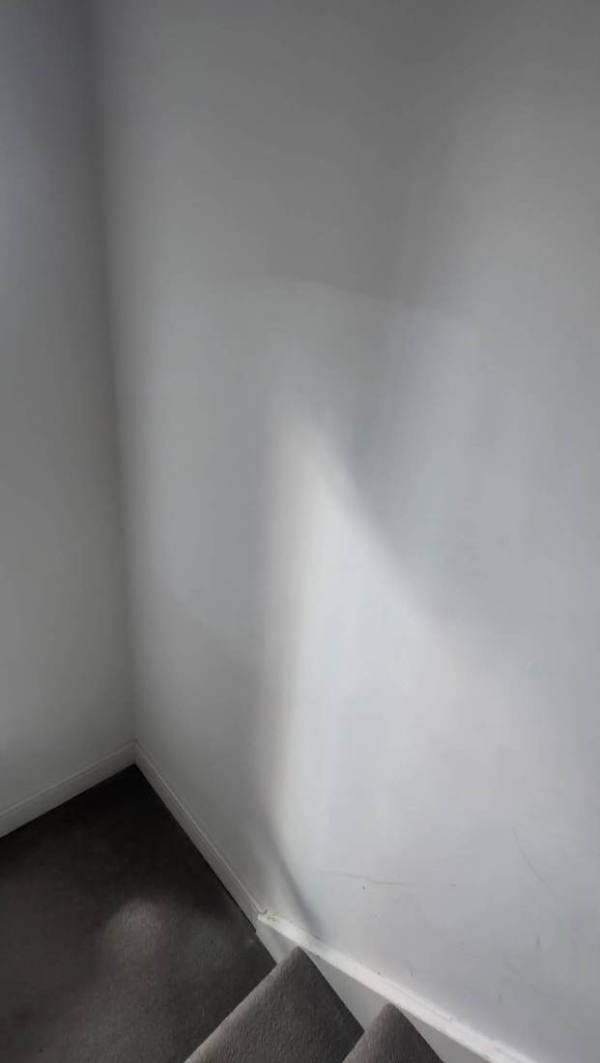 The same wall patched and painted