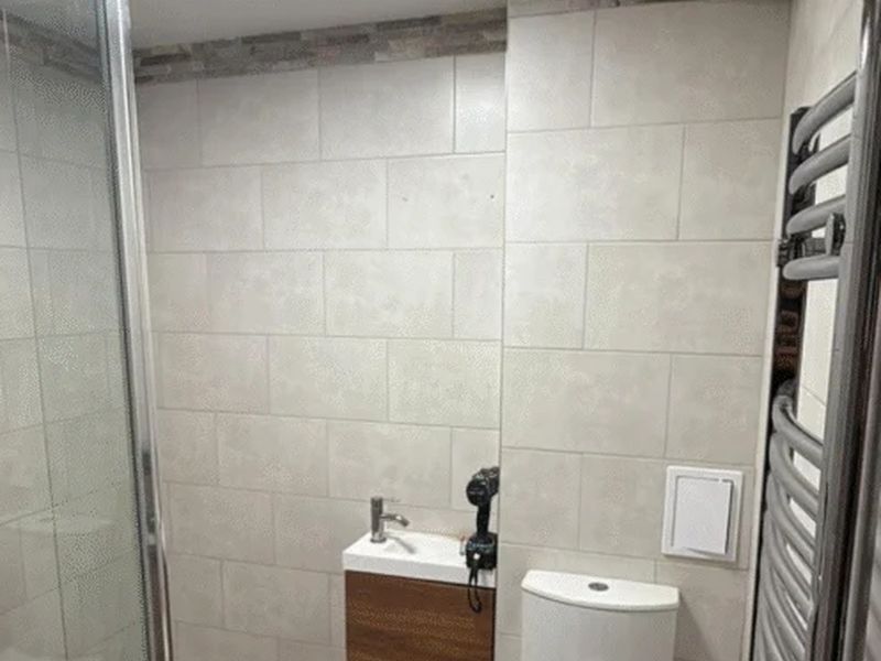 Refitted bathroom with walk-in shower