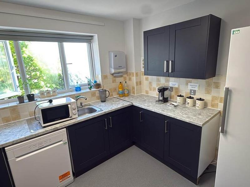 Refitted kitchen with navy units